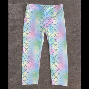 Women’s Multicolored Mermaid cropped workout pants from FeedMeFightMe! Size S.
